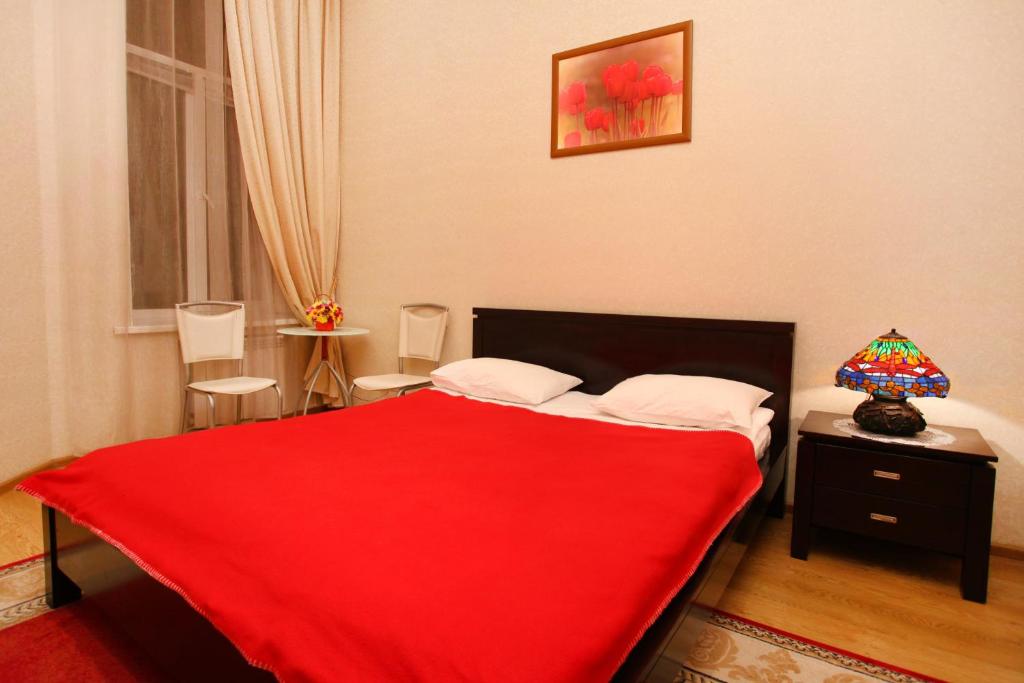 Postel nebo postele na pokoji v ubytování Ekaterina Hotel