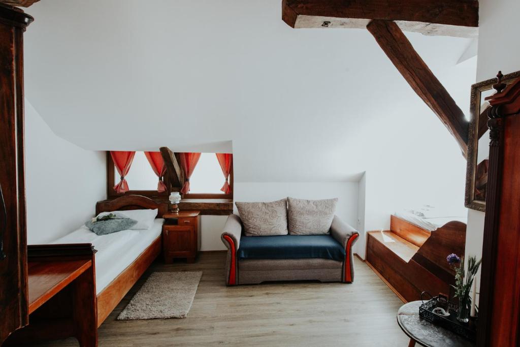 Postel nebo postele na pokoji v ubytování RANČ JUREŠ