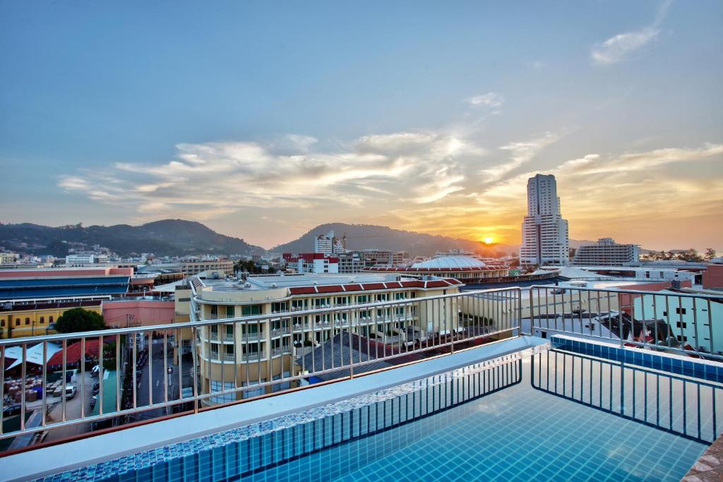 a view of the city from the rooftop of a building at Orchid Resortel in Patong Beach