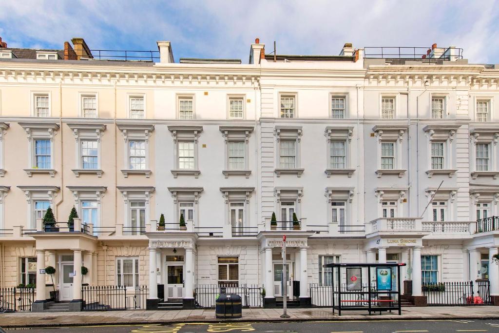 a large white building with a lot of windows at Lidos Hotel in London
