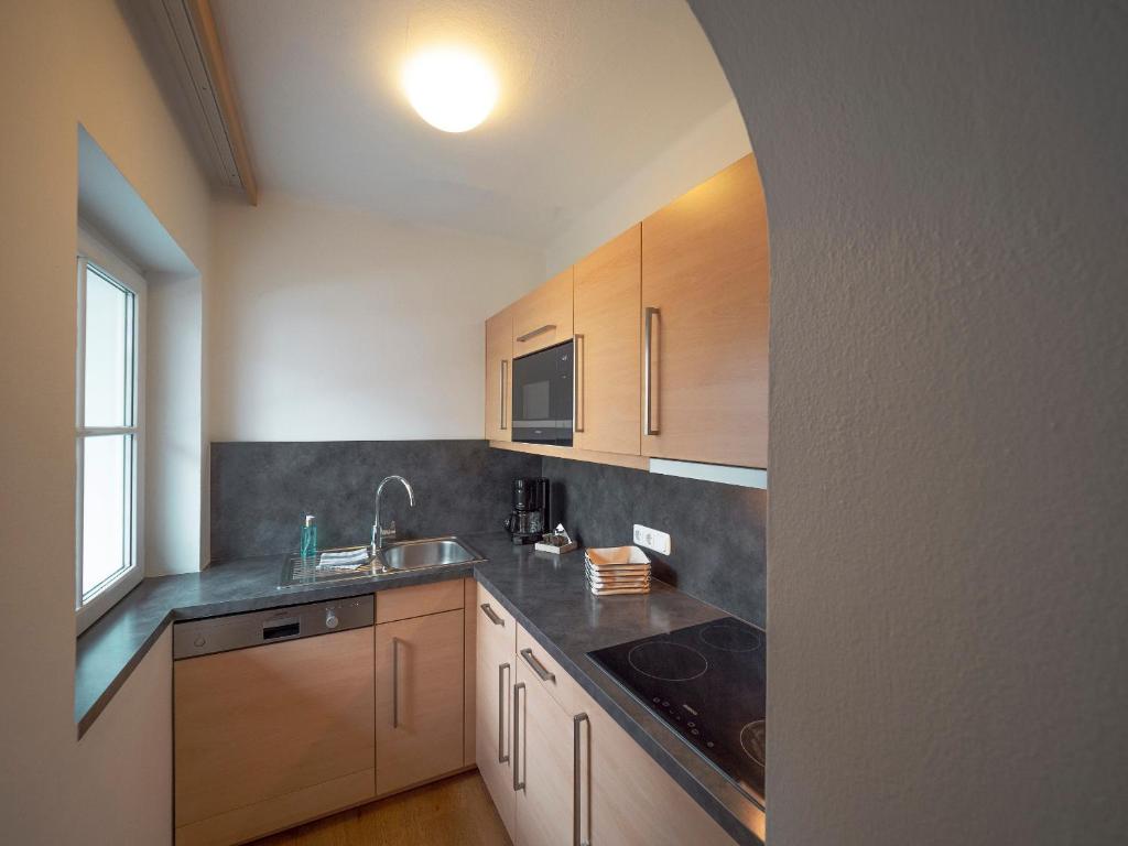 Kuchyňa alebo kuchynka v ubytovaní Haus Veronika - Appartements by Miha