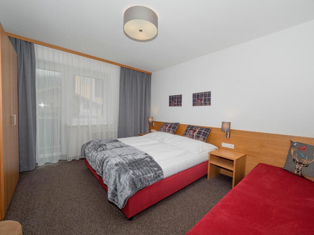Posteľ alebo postele v izbe v ubytovaní Haus Veronika - Appartements by Miha