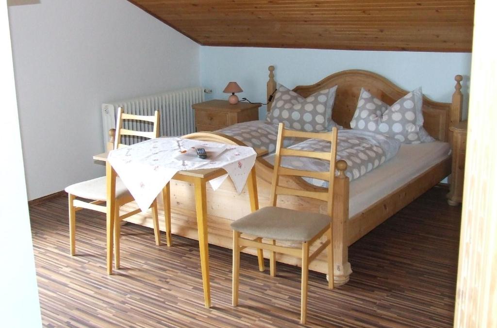 Postel nebo postele na pokoji v ubytování Pension Sonnenhof