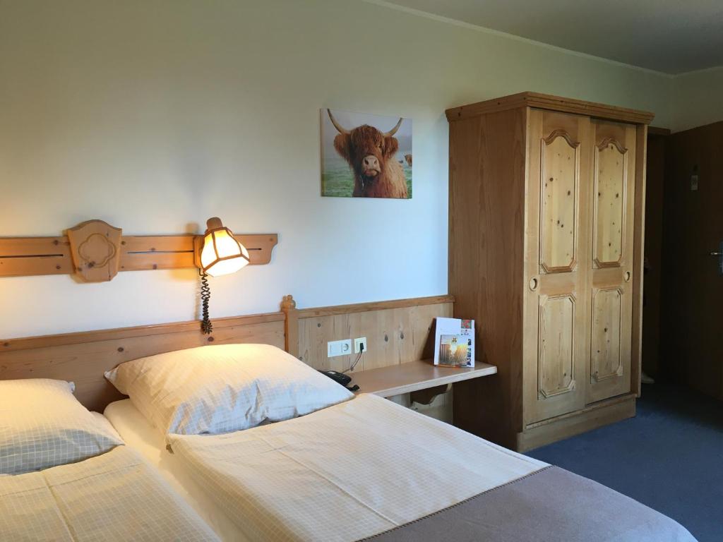 Postel nebo postele na pokoji v ubytování Flair Landhotel Strengliner Mühle