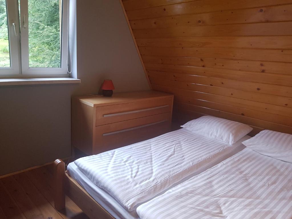 Postel nebo postele na pokoji v ubytování CIME Ekonomik