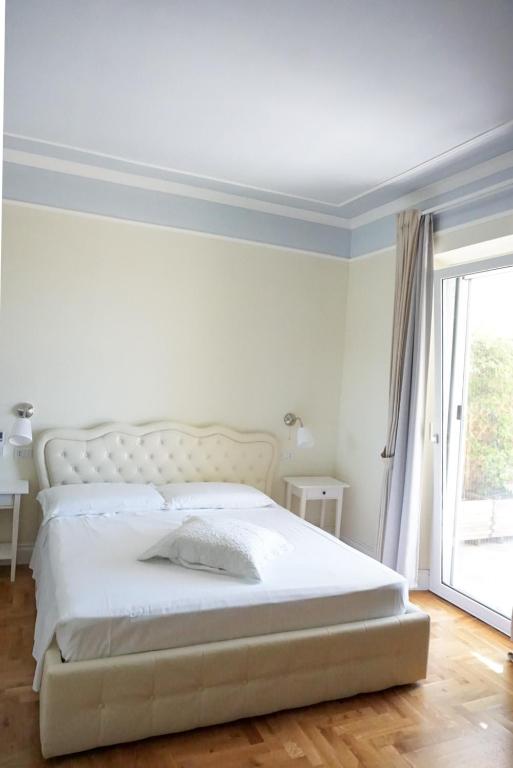 Postel nebo postele na pokoji v ubytování Aquae Sinis Albergo Diffuso
