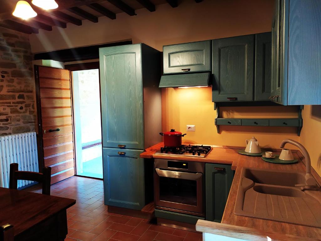 Kuchyň nebo kuchyňský kout v ubytování Frigino Agriturismo