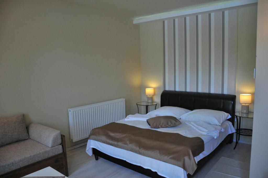 Postel nebo postele na pokoji v ubytování Adler Hotel & Wellness