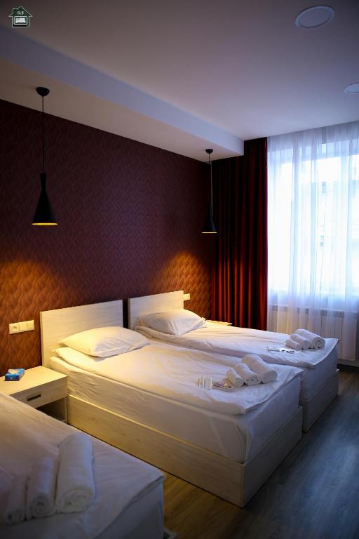 Postel nebo postele na pokoji v ubytování Gyurji Home - Guest House in Gyumri