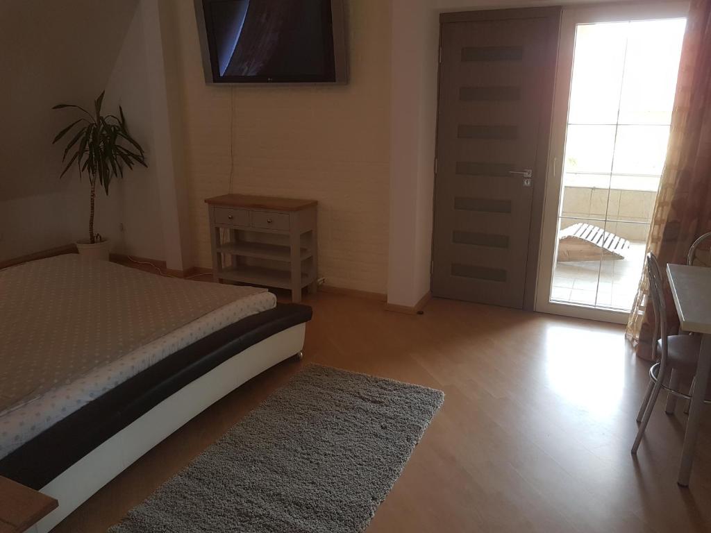 Postel nebo postele na pokoji v ubytování Lara Guest House
