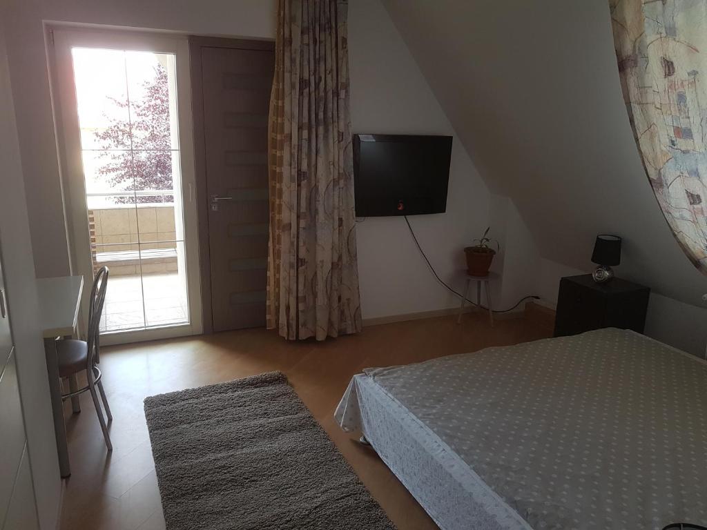 Postel nebo postele na pokoji v ubytování Lara Guest House