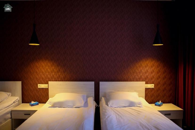 Postel nebo postele na pokoji v ubytování Guest House in Gyumri
