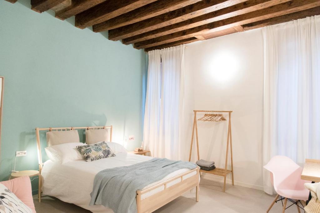Postel nebo postele na pokoji v ubytování Mirandolina Venice Exclusive Apartment