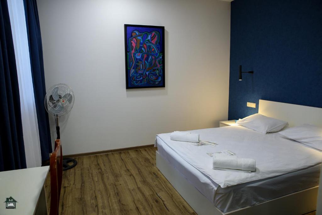 Postel nebo postele na pokoji v ubytování Gyurji Home - Guest House in Gyumri