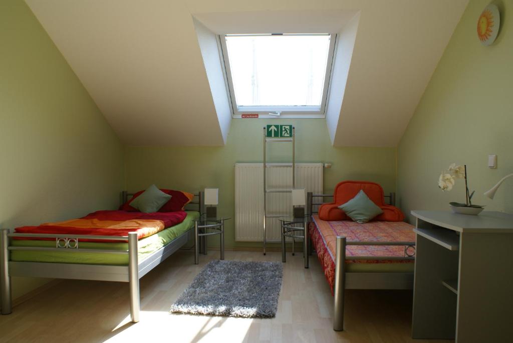 Katil atau katil-katil dalam bilik di Freundlich helles Appartment