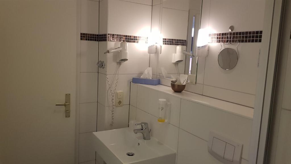 Koupelna v ubytování Hotel Amber Altstadt