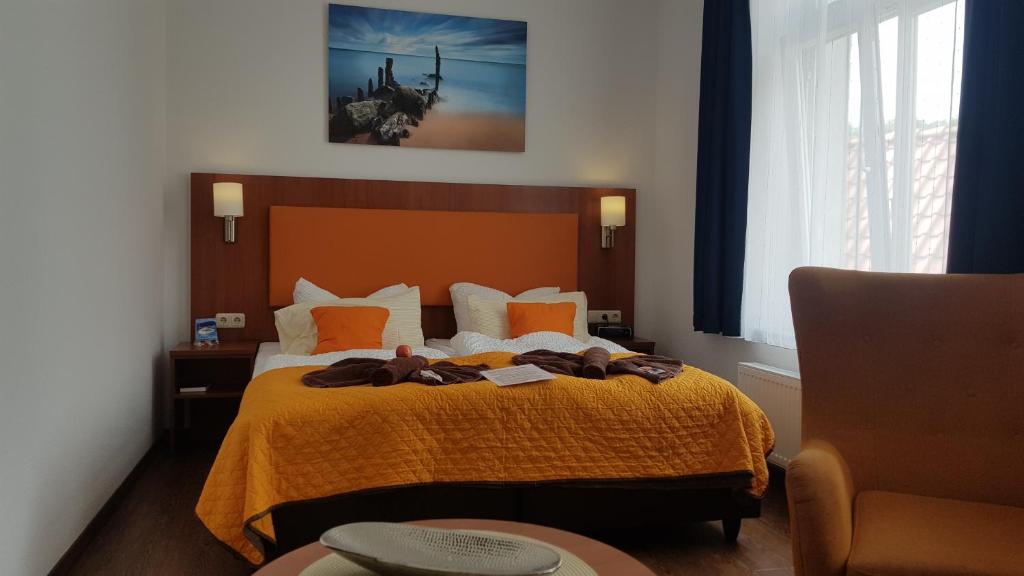 Postel nebo postele na pokoji v ubytování Hotel Amber Altstadt