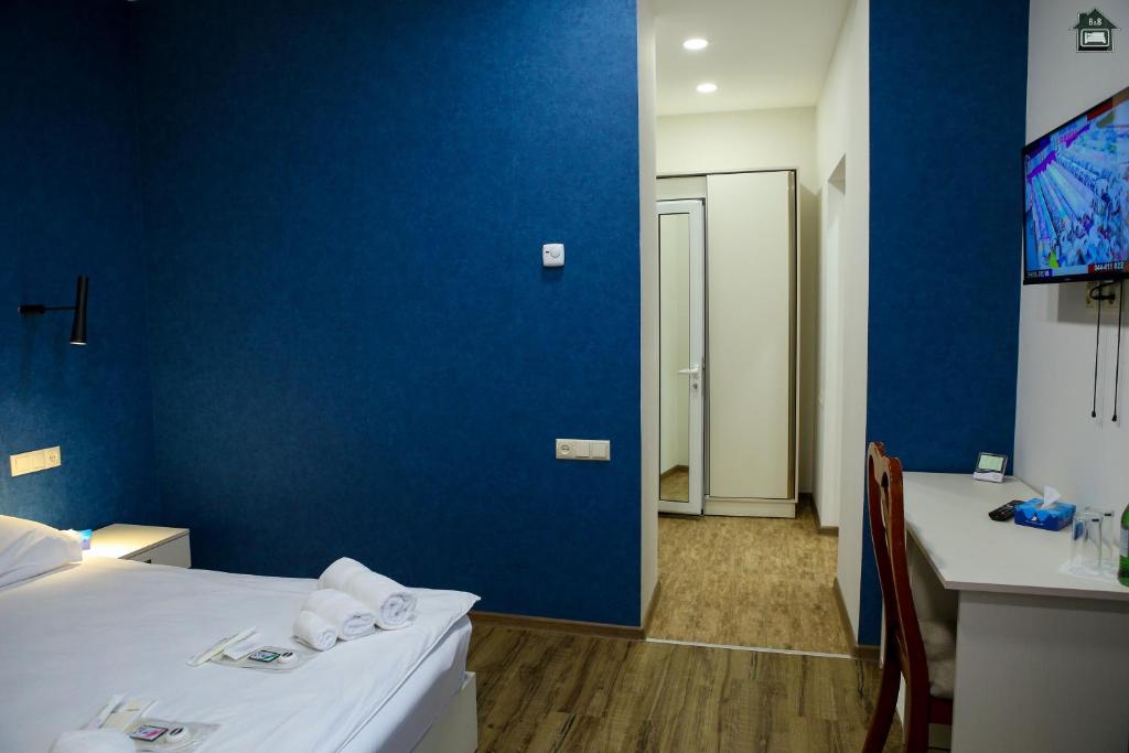 Postel nebo postele na pokoji v ubytování Gyurji Home - Guest House in Gyumri