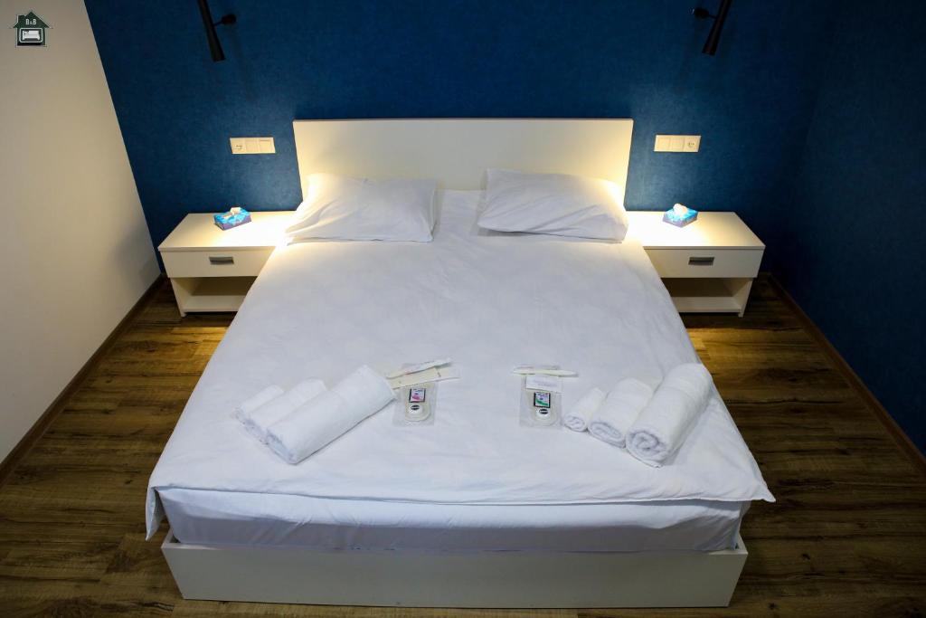 Postel nebo postele na pokoji v ubytování Gyurji Home - Guest House in Gyumri