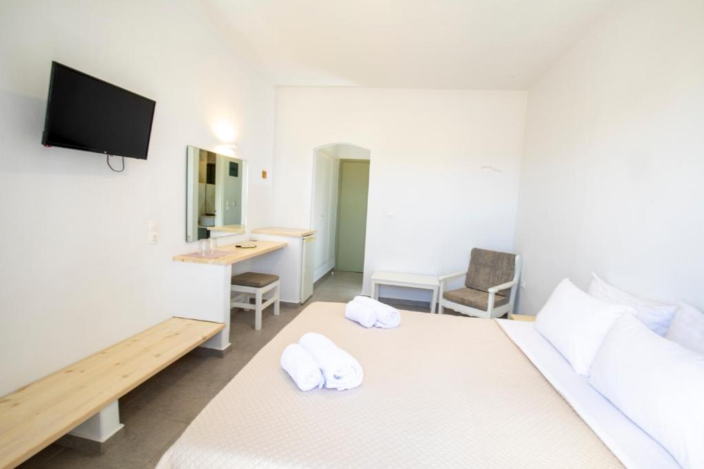 Postel nebo postele na pokoji v ubytování Hotel Galini Sifnos