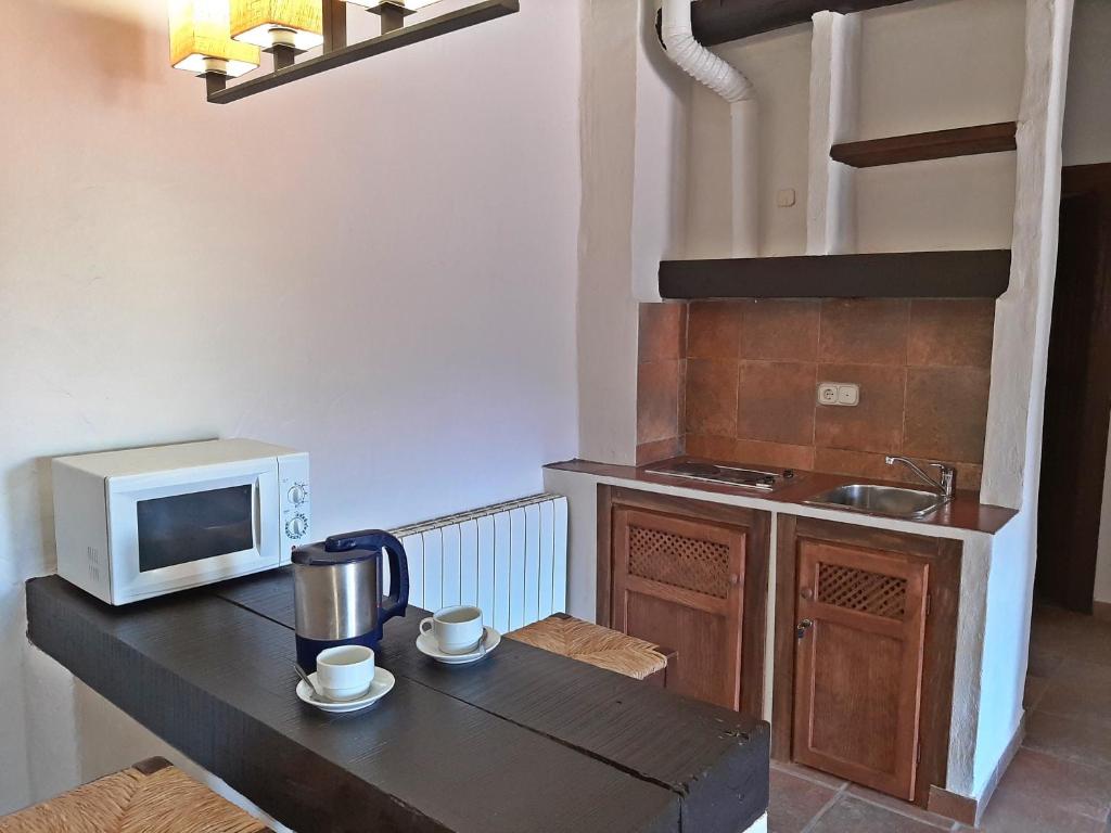 Kuchyň nebo kuchyňský kout v ubytování Hotel Apartamento Nueva Alcazaba