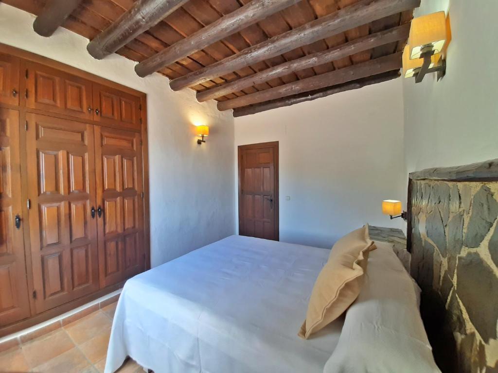 Postel nebo postele na pokoji v ubytování Hotel Apartamento Nueva Alcazaba
