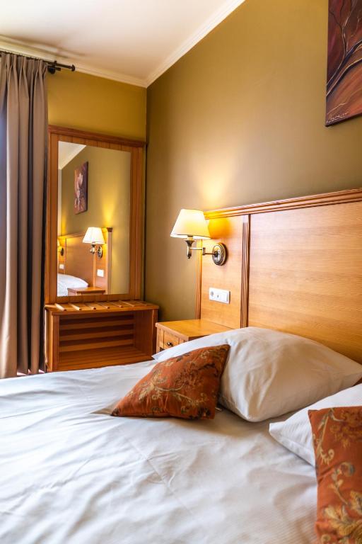 Postel nebo postele na pokoji v ubytování Eco Active Resort PIENINY