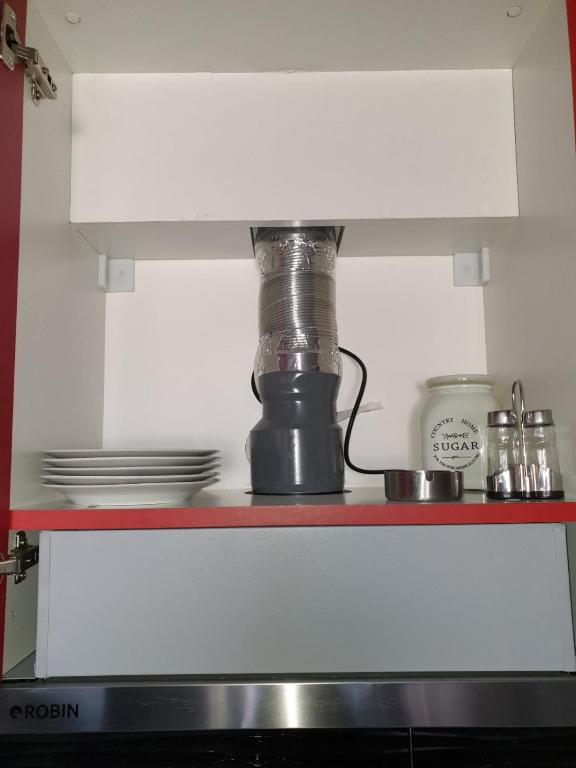 Kuchyň nebo kuchyňský kout v ubytování M & M Red Luxury