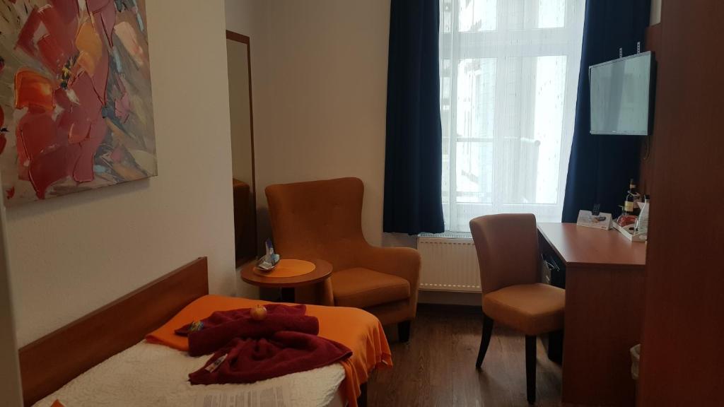 Postel nebo postele na pokoji v ubytování Hotel Amber Altstadt