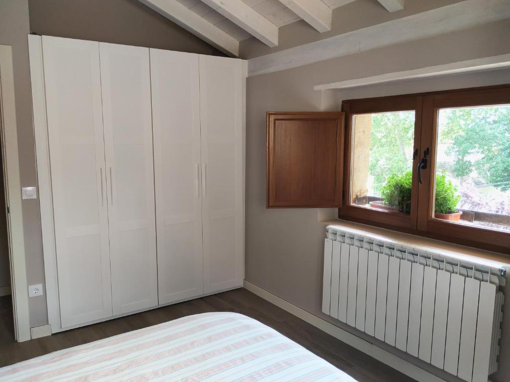 Postel nebo postele na pokoji v ubytování La Casa de las Tinas