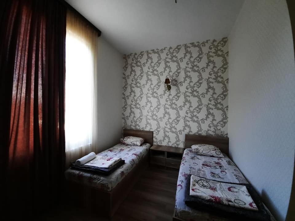 Postel nebo postele na pokoji v ubytování Hotel Alley