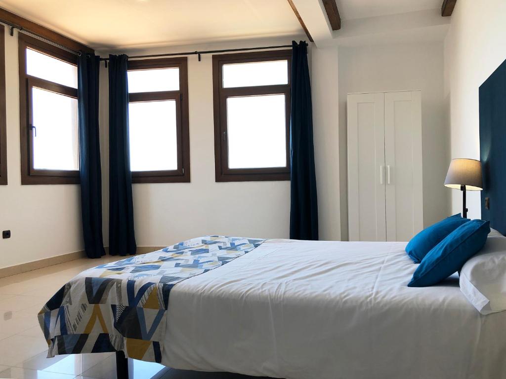 Postel nebo postele na pokoji v ubytování Cotillo Ocean View