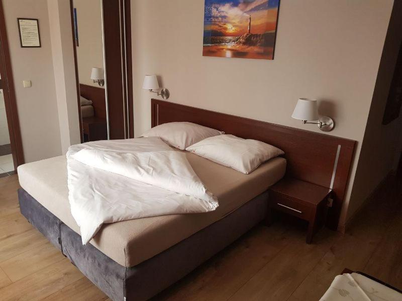 Postel nebo postele na pokoji v ubytování Villa Carmen