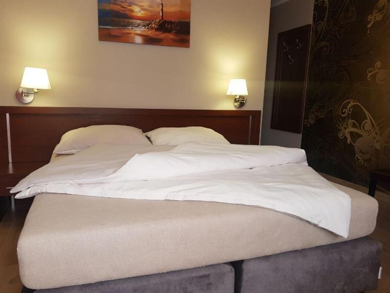 Postel nebo postele na pokoji v ubytování Villa Carmen