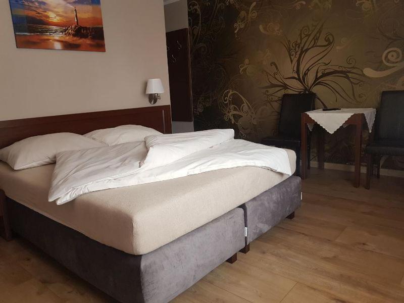 Postel nebo postele na pokoji v ubytování Villa Carmen