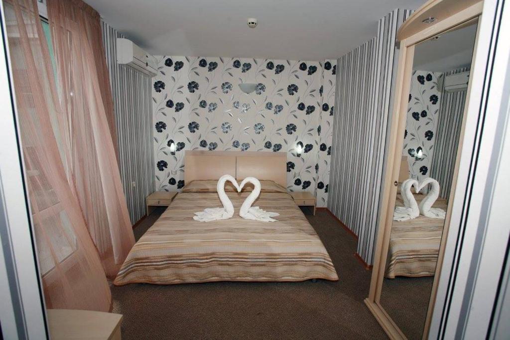 Postel nebo postele na pokoji v ubytování Sania
