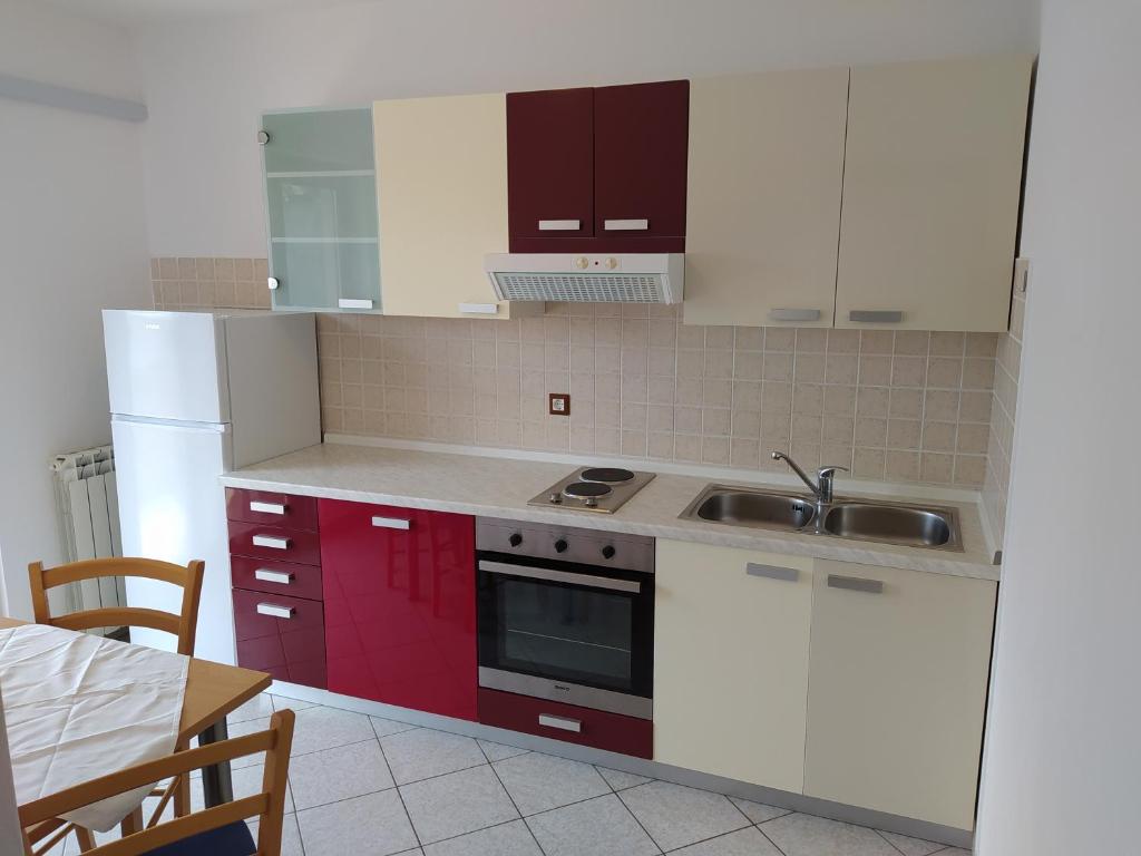 Kuchyň nebo kuchyňský kout v ubytování Apartmani Kolenko Rovinj