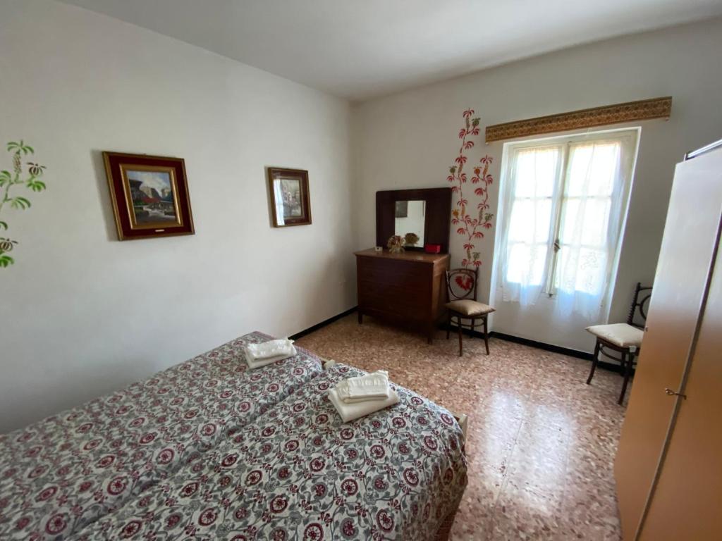 Postel nebo postele na pokoji v ubytování Appartamenti NeMoZo Moretti