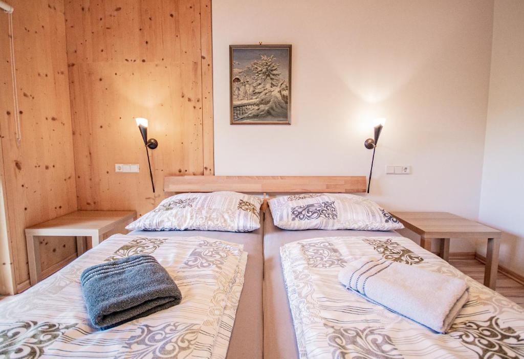Postel nebo postele na pokoji v ubytování Gschnitzerhof