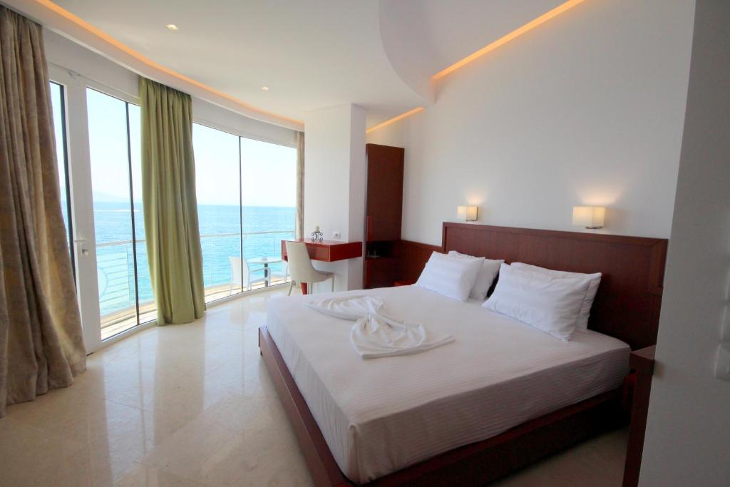 Cama o camas de una habitación en Hotel Delfini