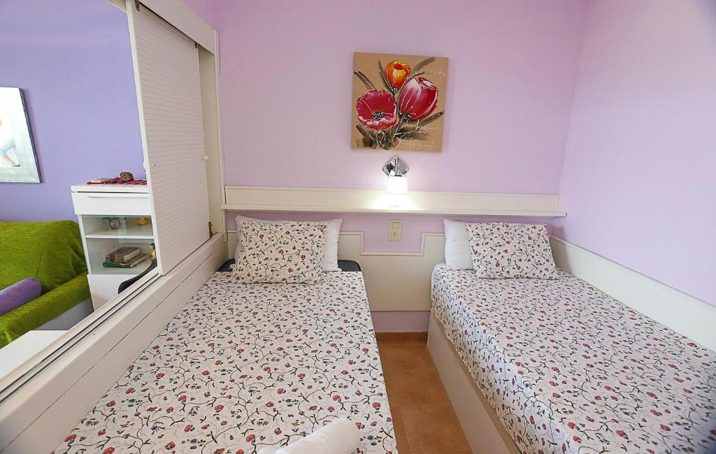 Posteľ alebo postele v izbe v ubytovaní COSTA DAURADA APARTAMENTS - Internacional Luxe