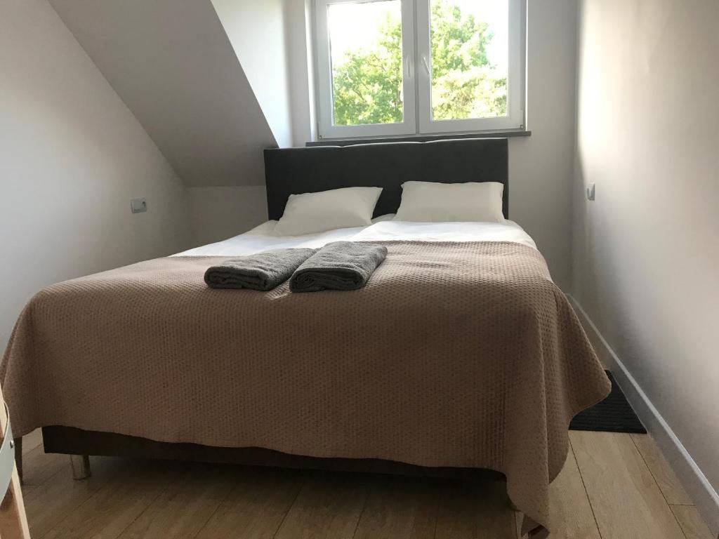 Posteľ alebo postele v izbe v ubytovaní Apartamenty "NaLetniej" Przy Morzu