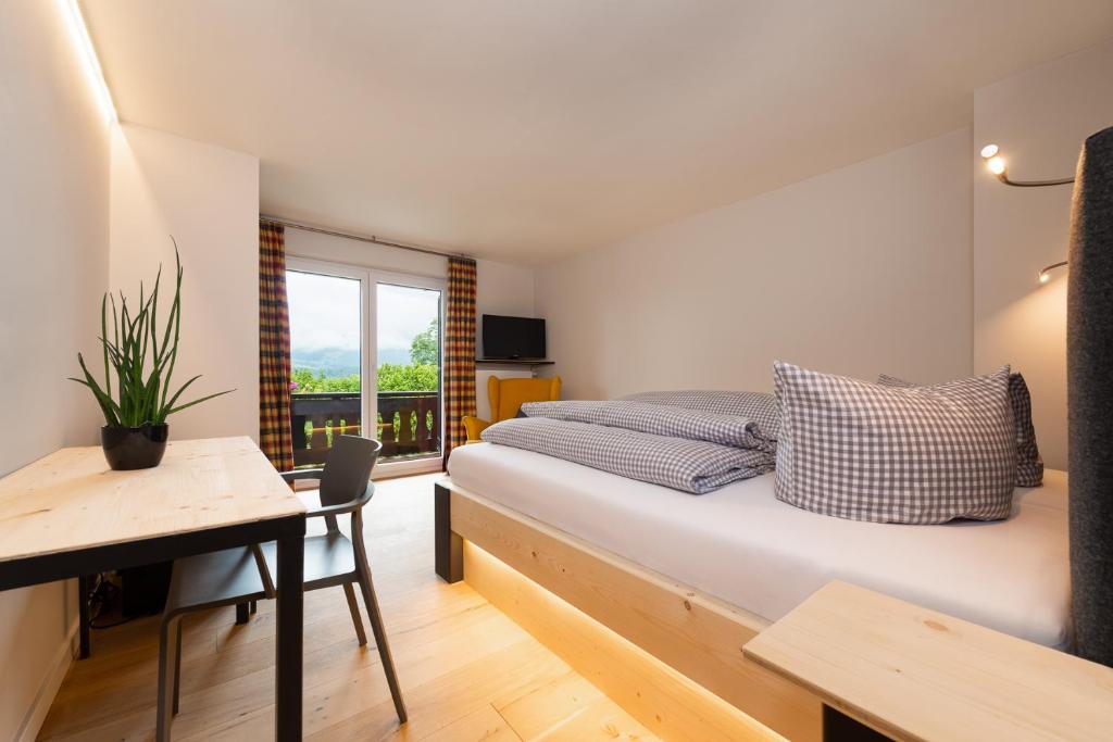 Postel nebo postele na pokoji v ubytování freistil Boutiquehotel