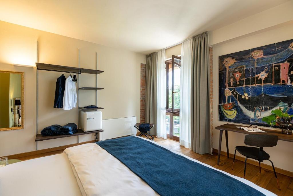 Postel nebo postele na pokoji v ubytování Cascina Bo