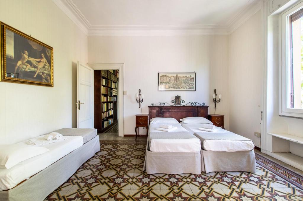 A bed or beds in a room at Trastevere Decò Apartment