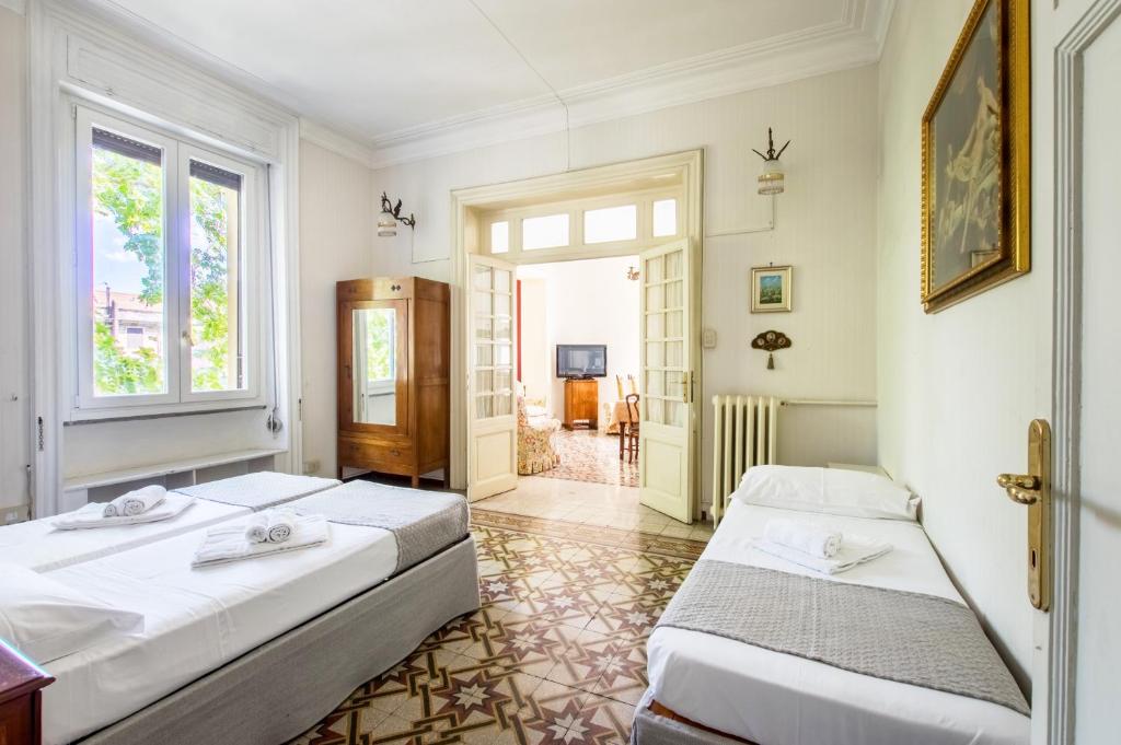 A bed or beds in a room at Trastevere Decò Apartment