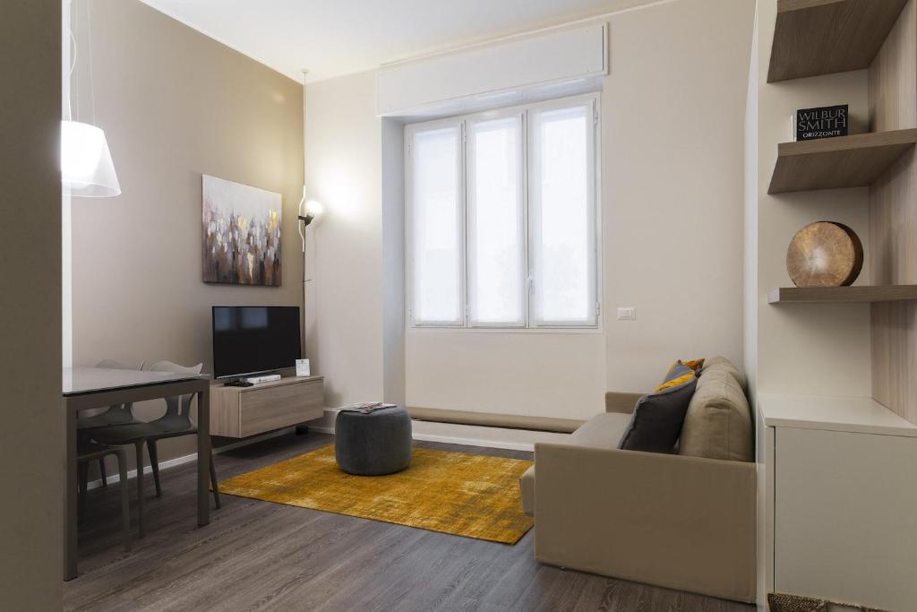 Televízia a/alebo spoločenská miestnosť v ubytovaní Contempora Apartments - Cavallotti 13 - B12b