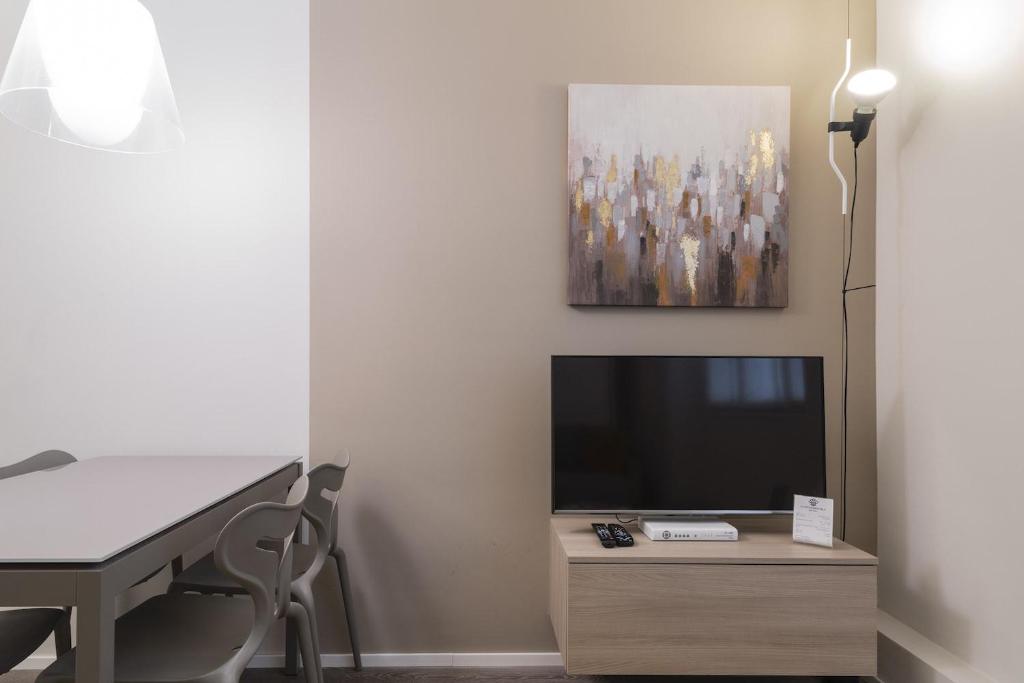 Televízia a/alebo spoločenská miestnosť v ubytovaní Contempora Apartments - Cavallotti 13 - B12b