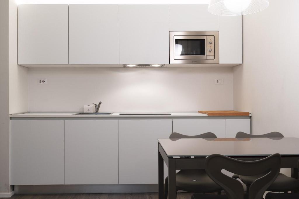 Kuchyňa alebo kuchynka v ubytovaní Contempora Apartments - Cavallotti 13 - B12b