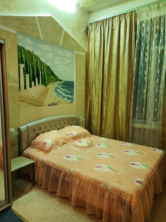 Ένα ή περισσότερα κρεβάτια σε δωμάτιο στο Курорт Куяльник